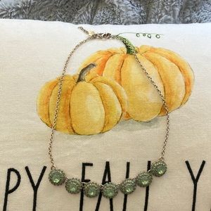 Green stone choker necklace.